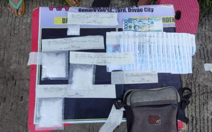 <p><strong>DRUG EVIDENCE</strong>. Police officers seize some PHP2.4 million worth of shabu in an anti-illegal drug operation in Crossing Bayabas Toril in Davao City on Wednesday (Oct. 5, 2022). The suspect, identified as Romil Quilo, ranks fifth as a high-value target individual at the regional level, according to the police. <em>(Photo courtesy of PRO-11)</em></p>