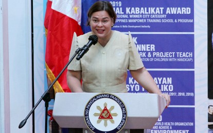 <p><strong>BRINGING F2F CLASSES BACK</strong>. Vice President and Education Secretary Sara Duterte delivers her speech during the distribution of gifts and educational materials to daycare learners in Mandaluyong City on Thursday (Oct. 6, 2022). Duterte said the Department of Education's milestone for its first 100 days was bringing back face-to-face learning in schools. <em>(PNA photo by Joseph Razon)</em></p>