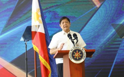 <p><strong>BIG TICKET PROJECTS.</strong> President Ferdinand "Bongbong" Marcos Jr. delivers a message during the contract signing of the South Commuter Railway Project at The Plaza in Calamba City, Laguna on Thursday (Oct. 6, 2022). Marcos said the Philippines is serious about pursuing big ticket projects that are vital to economic progress and recovery from the Covid-19 pandemic. <em>(PNA photo)</em></p>