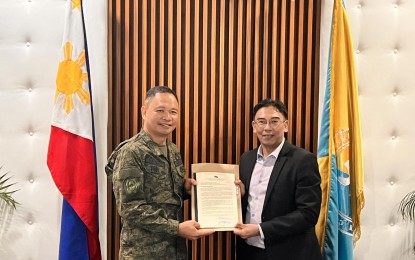 <p>AFPCLOAC chief Brig. Gen. Joel Alejandro Nacnac (left) and Commission on Human Rights chair Richard Palpal-Latoc (right) <em>(Photo courtesy of AFP)</em></p>