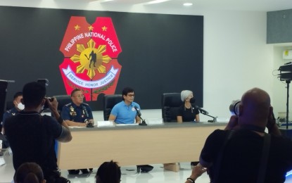 <p><strong>BRIEFING.</strong> Philippine National Police chief Gen. Rodolfo Azurin Jr., Local Government Secretary Benjamin Abalos Jr., and Manila Mayor Honey Lacuna (from left) face the media in a press conference at Camp Crame, Quezon City on Sunday (Oct. 9, 2022). They narrated the details on the confiscation of PHP6.7 billion worth of shabu and the arrest of several suspects, including a cop. <em>(Courtesy of PTV Facebook)</em></p>