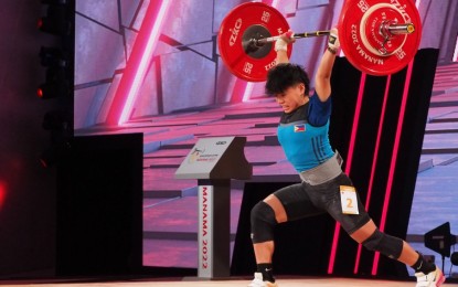 <p><strong>BRONZE WINNER.</strong> Rose Jean Ramos in action during the Asian Weightlifting Championships in Manama, Bahrain on Oct. 8, 2022. Ramos won the bronze medal in the clean and jerk of the women's 45kg category. <em>(Photo courtesy of Asian Weightlifting Federation)</em></p>