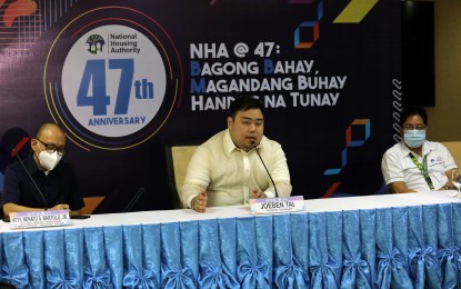 <p><strong>NHA AT 47</strong>. National Housing Authority General Manager Joeben Tai (center) delivers his message at a press conference celebrating the NHA's 47th anniversary in Quezon City on Monday (Oct. 10, 2022). Tai said he is eyeing to renew the NHA charter which is due to expire in 2025. <em>(PNA photo by Joey O. Razon)</em></p>