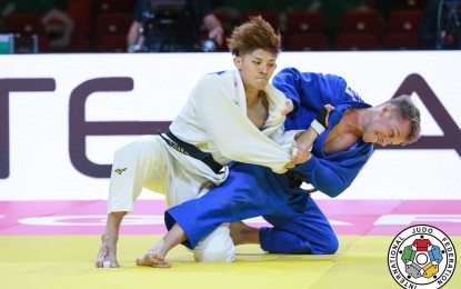 <p>Filipino-Japanese Shugen Nakano (left) faces Nathan Katz of Australia during the 2021 World Judo Championships in Hungary. The two-time Southeast Asian Games gold medalist is coming off a win last month at the Tahiti Oceania Open, beating Kerin Vasapolli of French Polynesia in the men's minus 66-kilogram category. <em>(Photo courtesy of International Judo Federation)</em></p>
