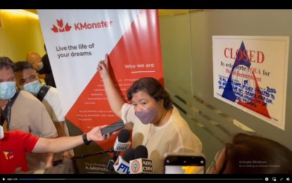 <p><strong>SHUTDOWN.</strong> Department of Migrant Workers Secretary Susan Ople leads the closure of K-Monster Inc., an immigration consultancy firm that illegally recruits workers, in Barangay San Lorenzo, Makati City on Tuesday (Oct. 11, 2022). Ople said the agency has no license to employ workers abroad. <em>(Screengrab from DMW Facebook)</em></p>
