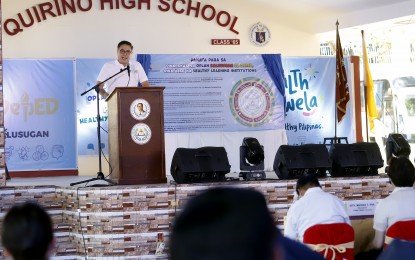 <p><strong>'OK SA DEPED'</strong>. Education Undersecretary and Chief of Staff Epimaco Densing III delivers his message during the launch of Oplan Kalusugan sa DepEd (OK sa DepEd) and the Healthy Learning Institutions at the Quirino High School in Quezon City on Tuesday (Oct.11, 2022). Densing stressed the importance of upholding learners' health and safety. <em>(PNA photo by Alfred Frias)</em></p>
