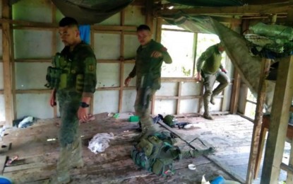 <p><strong>CAPTURED SAFE HOUSE.</strong> Soldiers scour the safe house where explosives and firearms, believed to be owned by the outlawed Bangsamoro Islamic Freedom Fighters (BIFF), are recovered in Datu Salibo, Maguindanao, on Monday (Oct. 10, 2022). The safe house is situated in the middle of the vast marshland bordering two villages in the town.<em> (Photo courtesy of 6IB)</em></p>