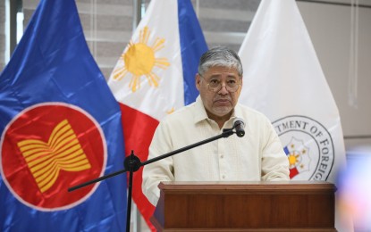 <p><strong>PURSUING PH'S INTERESTS.</strong> Department of Foreign Affairs Secretary Enrique Manalo delivers his remarks during the ribbon-cutting ceremony for the refurbished facilities of the Office of Consular Affairs at Aseana Business Park in Parañaque City on Oct. 12, 2022. In 2023, the Department of Foreign Affairs worked hard to protect the rights of Filipinos both abroad and within the country’s very own waters while continuing to increase interaction with countries to boost cooperation in areas of mutual interest.<em> (PNA photo by Avito Dalan)</em></p>