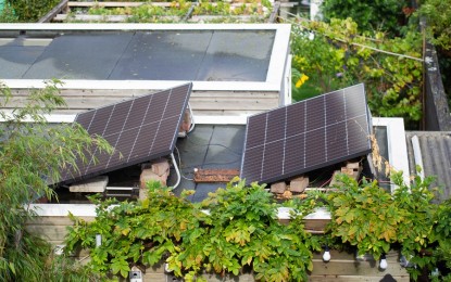 <p>Solar panels are placed on the roofs of buildings in Haarlem, the Netherlands, Sept. 10, 2022. <em>(Photo by Sylvia Lederer/Xinhua)</em></p>