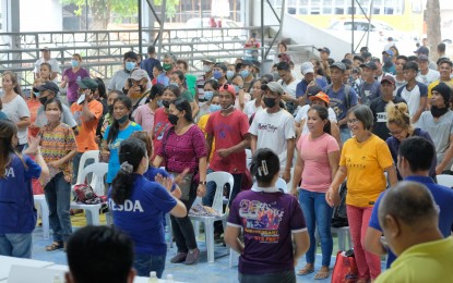 <p><strong>PROJECT BENEFICIARIES</strong>. Former rebels and farmers from insurgency-free villages in the 5th district of Negros Occidental attend the launch of the skills training and other livelihood intervention projects under the National Task Force to End Local Communist Armed Conflict (NTF-ELCAC) in Isabela town on Oct. 5, 2022. The projects will be implemented by the NTF-ELCAC’s Poverty Reduction, Livelihood, and Employment Cluster chaired by the Technical Education and Skills Development Authority. <em>(Photo courtesy of TESDA-Negros Occidental)</em></p>