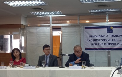 <p>Governance Commission for Government Owned and Controlled Corporation (GCG) Chairperson Alex L. Quiroz (right), GCG Commissioners Gideon D.V. Mortel (middle), and Geraldine Berberabe-Martinez (left). <em>(PNA file photo by Joann Villanueva) </em></p>