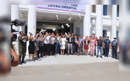 <p><strong>INSURGENCY-FREE.</strong> Officials of the Department of National Defense (DND), Eastern Mindanao Command, the Philippine National Police, and the Davao Oriental provincial government, free white doves as a symbol of peace after the province was formally declared insurgency free on Friday (Oct. 14, 2022). The declaration came following the dismantling of the New People's Army (NPA) Guerilla Front's North, South in 2021 and 2022. <em>(Photo courtesy of 10ID)</em></p>