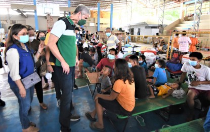 <p><strong>EVACUEES</strong>. Negros Occidental Gov. Eugenio Lacson meets with evacuees (in this undated photo) who are staying at temporary shelters following a series of clashes between government troops and the New People's Army. The Diocese of Dumaguete is mobilizing relief efforts to send aid to the thousands who have been displaced by the internal conflict. <em>(Photo courtesy of Negros Occidental Capitol PIO Facebook)</em></p>