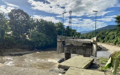 <p><strong>HARDEST HIT</strong>. The approach of the Masi Bridge in Adams, Ilocos Norte is damaged by Typhoon Neneng on Monday (Oct. 17, 2022). Neneng has so far left over PHP177.6 million worth of damage in the province. (<em>Contributed Photo)</em></p>