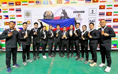 <p><strong>MEDALISTS</strong>. Team Philippines bags 11 medals in the 2022 Asian Pencak Silat Championships in Srinagar, India on Oct. 13-16, 2022. Team members are (L-R) Alvin Campos, Ian Christopher Call, Mark James Lacao, Franchette Anne Tolentino, Jessa Dela Cruz, Almohaidib Abad, Alfau Jan Abad, Ziara Mari Oquindo, Edmar Tacuel, Angeline Virina, Jaciren Abad and Joash Cantoria.<em> (Contributed photo)</em></p>