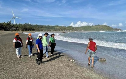 <p>RELEASED. Environment personnel and other wildlife volunteers facilitate the release of two green sea turtles on Tuesday (Oct. 18, 2022) in Sitio Ayoyo, Barangay Caparispisan, Pagudpud, Ilocos Norte. The Pagudpud Pawikan Conservation Group urged the public to report any sightings of <em>pawikan</em> in their area. <em>(Photo courtesy of the Pagudpud Pawikan Conservation Group)</em></p>