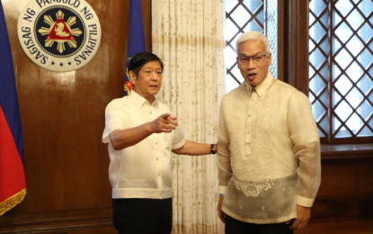 <p><strong>PROPER NUTRITION</strong>. President Ferdinand R. Marcos discusses with Philippine Sports Commission chairperson Noli Eala the importance of proper nutrition for the national athletes during their meeting at Malacañang Palace on Oct. 14, 2022. Eala promised to focus on the athletes’ nutrition as they prepare for big international sports events, including the 2024 Paris Olympics. <em>(Contributed photo)</em></p>