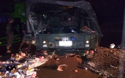 <p><strong>MISHAP.</strong> Food supplies loaded on a KM-450 truck of the Philippine Army are scattered on the road after it crashed into a parked cement mixer in Barangay Buenasuerte, Uson, Masbate on Oct. 16, 2022. The Philippine Army has ordered an investigation into the mishap which left eight soldiers dead and six others injured.<em> (Photo courtesy of 9th Infantry Division)</em></p>