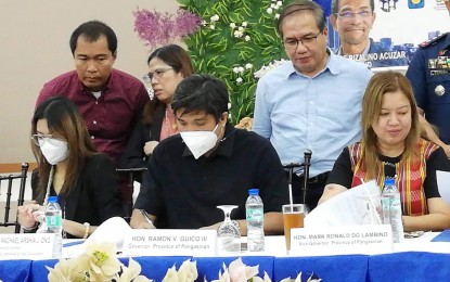 <p><strong>PARTNERSHIP. </strong>Department of Human Settlements and Urban Development (DHSUD) Assistant Secretary, lawyer Hanica Rachael Arshia Ong (left), and Pangasinan Governor Ramon Guico III (2nd from left) sign a memorandum of agreement on Oct. 18, 2022 for the Pambansang Pabahay para sa Pilipino Zero Informal Settlers Family by 2028 program. It targets to address the 300,000 housing backlog in the Ilocos Region. <em>(PNA photo by Hilda Austria) </em></p>