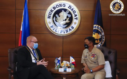 <p><strong>STRONGER TIES.</strong> Finnish Ambassador to the Philippines Juha Markus Pykko (left) shares a light moment with PN acting flag officer in command, Rear Admiral Caesar Bernard Valencia, at the Navy headquarters in Naval Station Jose Andrada, Manila on Oct. 17, 2022. The two officials discussed the ongoing PN modernization program being one of the conceivable areas of collaboration between the Philippines and Finland. <em>(Photo courtesy of Philippine Navy)</em></p>