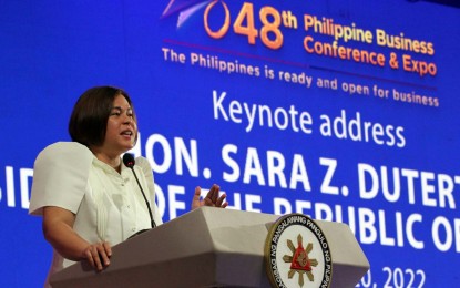 <p><strong>MORE JOB OPPORTUNITIES</strong>. Vice President and concurrent Education Secretary Sara Duterte delivers a keynote speech during the 48th Philippine Business Conference and Expo 2022 at the Manila Hotel in Manila City on Wednesday (Oct. 19, 2022). Duterte hopes to intensify collaboration between the education and business sectors to ensure more job opportunities for first-time job seekers, particularly Grade 12 graduates. <em>(PNA photo by Joey O. Razon)</em></p>