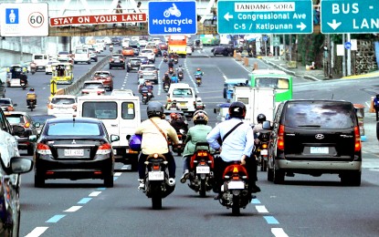 <p>Commonwealth Avenue in Quezon City <em>(PNA photo by Ben Briones)</em></p>