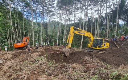 <p><strong>CONTINUED SEARCH.</strong> Backhoe operators dig through Sitio Mabuhay in Barangay San Luis, Malitbog, Bukidnon in search of five landslide victims on Oct. 17, 2022. Two more bodies were retrieved on Saturday (Oct. 22, 2022), leaving just one missing. <em>(Courtesy of the Bukidnon PDRRMO)</em></p>