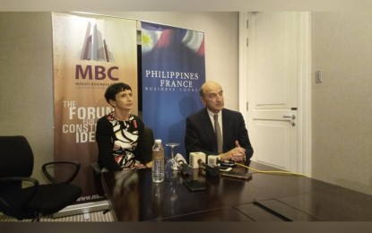 <p><strong>BIZ DELEGATION</strong>. French Ambassador to the Philippines Michele Boccoz (left) and Movement of the Enterprises of France Head of Delegation Philippe Matiere (right) during a press conference at Discovery Primea in Makati City on Monday (Oct. 24, 2022). Boccoz and Matiere affirm the interest of French businesses in looking for investment opportunities in the Philippines. <em>(PNA photo by Kris Crismundo)</em></p>