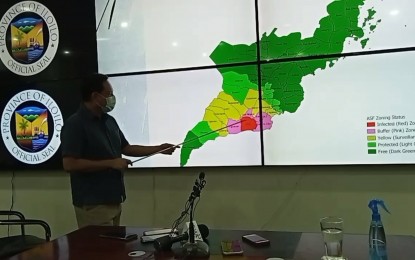 <p><strong>SUPPORT</strong>. Iloilo Governor Arthur Defensor Jr. presents the zonal map of the province during a press conference on Oct. 17, 2022. Dr. Jonic Natividad, chief of the Regulatory Division of the Department of Agriculture in Western Visayas, has urged stakeholders to help safeguard areas situated in the green zones. <em>(PNA photo screen grab from live streaming)</em></p>