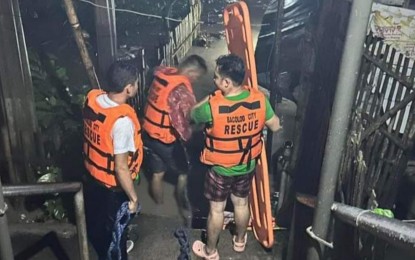 <p><strong>DISASTER RESPONSE</strong>. Responders of Bacolod City Disaster Risk Reduction and Management Office prepare to rescue residents in flood-hit areas on Wednesday night (Oct. 26, 2022). Mayor Alfredo Abelardo Benitez suspended classes in the city on Thursday (Oct. 27) due to rains and floods brought by Tropical Storm Paeng. <em>(Photo courtesy of Bacolod City DRRMO)</em></p>