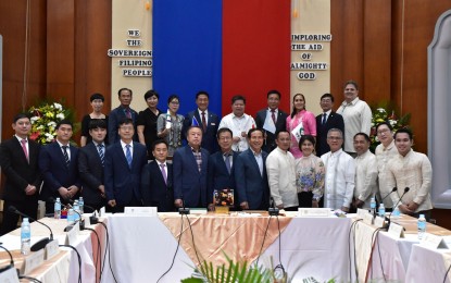 <p><strong>SISTER CITIES.</strong> Officials of Dumaguete City, Negros Oriental and Yeongdong-gun in South Korea strike a pose at the city session hall on Thursday (Oct. 27, 2022) after signing a memorandum of agreement (MOA) that seeks to strengthen bilateral ties on employment, tourism, and culture. With MOA, more Dumaguete residents are expected to be hired as seasonal workers in Yeongdong-gun’s grape farms. <em>(Photo courtesy of Dumaguete City PIO)</em></p>
