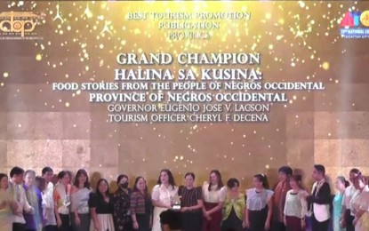 <p><strong>TOP TOURISM AWARD</strong>. The province of Negros Occidental was awarded the grand winner for Best Tourism Promotion Publication for the book “Halin sa Kusina: Food Stories from the People of Negros Occidental” in this year’s Pearl Awards. The awarding rites were held during the 23rd National Convention of the Association of Tourism Officers of the Philippines at the Taal Vista Hotel in Tagaytay City on Thursday night (Oct. 27, 2022).<em> (Video grab from ATOP Tagaytay 2022 Facebook Live)</em></p>
