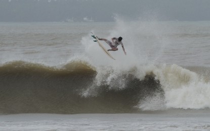 <p>A surfer in Borongan City, Eastern Samar. <em>(Photo courtesy of Borongan City information office)</em></p>