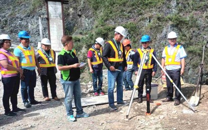 <p><strong>BRIDGE TO PEACE.</strong> OPAPP Assistant Secretary for Reconciliation and Unity Andres Aguinaldo Jr. (6th from left) leads the groundbreaking ceremony for the Betwagan Bridge in Sadanga, Mountain Province on Oct. 27, 2022. The PHP60-million project is the biggest project under the Payapa at Masaganang Pamanayan (PAMANA) Program of OPAPP in Sadanga.<em> (PNA photo courtesy of PROCOR PIO)</em></p>