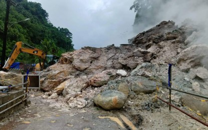 <p><strong>IMPASSABLE</strong>. A landslide, triggered by heavy rains caused by Paeng, renders a road leading to mountain villages in Valencia, Negros Oriental impassable early Saturday (Oct. 29, 2022). One person was reported to have died while scores of people were evacuated from many areas in the province due to heavy rains and flooding. <em>(Photo courtesy of Nicky Dumapit)</em></p>