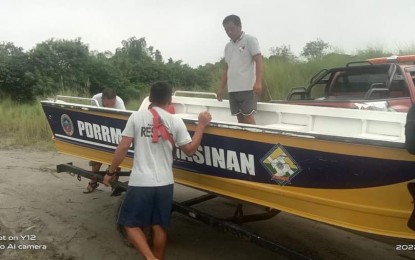 <p><strong>READY</strong>. Members of Pangasinan’s provincial disaster risk reduction and management office prepare a rescue boat for the possible onslaught of Severe Tropical Storm Paeng in the province on Friday (Oct. 28, 2022). The weather disturbance is expected to bring a high volume of rain. <em>(Photo courtesy of Pangasinan PDRRMO)</em></p>