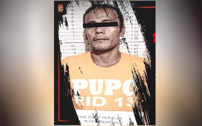<p><strong>FALLEN.</strong> Archie Bago Perales, 41, considered the most wanted New People’s Army rebel in the Caraga Region, is arrested in Barangay Diego Silang, Butuan City on Wednesday night (Oct. 26, 2022). He has seven arrest warrants for murder, kidnapping, and illegal detention. <em>(Courtesy of PRO-13 Information Office)</em></p>