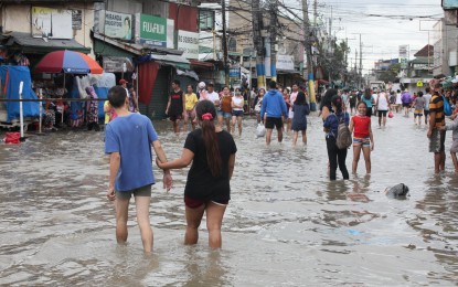 <p><strong>NATURAL CALAMITY.</strong> Portions of Zapote Road in Bacoor City, Cavite are flooded in this Oct. 30, 2022 photo. The province was among those hardest hit by Severe Tropical Storm Paeng the day before. <em>(PNA photo by Avito Dalan)</em></p>