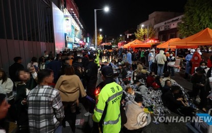 <p>People injured in the Itaewon stampede are treated after the deadly accident crushed more than 150 people to death during Halloween celebrations at the popular hangout district in Seoul, on Oct. 30, 2022. <em>(Yonhap)</em></p>