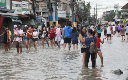 <p><strong>FLOODED HIGHWAY</strong>. Portions of Aguinaldo Highway in Bacoor City, Cavite were flooded on Sunday (Oct. 30, 2022). Tropical Storm Paeng hit the province hardest the night before, with Silang and Noveleta incurring the most damage. <em>(Photo photo by Avito Dalan)</em></p>