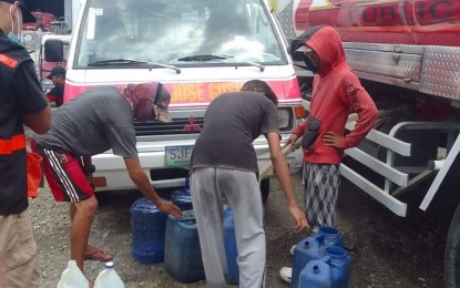 <p><strong>WATERLESS</strong>. Water tankers of the City Disaster Risk Reduction and Management Office deliver water Sunday (Oct. 30, 2022) to barangays in the west coast of Zamboanga City that have been waterless since Friday (Oct. 28, 2022) when the Zamboanga City Water District's distribution facility, operated by Prime Water, was affected by flooding caused by Tropical Storm Paeng and was forced to undergo emergency shutdown. Paeng left four dead from drowning and two others missing, while 10,754 families were displaced. <em>(Photo courtesy of City Hall PIO)</em></p>