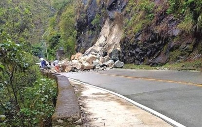<p><strong>ROCKSLIDE.</strong> The Ambuklao section of the Benguet-Vizcaya road was among the national roads in the region that was closed to vehicular traffic at the height of Severe Tropical Storm Paeng due to heavy rains and strong winds on Oct. 30. The Department of Public Works and Highways in the region said that the road clearing operations are still being done in areas that are still closed due to landslide while alternative roads will start construction on Tuesday (Nov. 1, 2022).<em> (Photo courtesy of DPWH)</em></p>