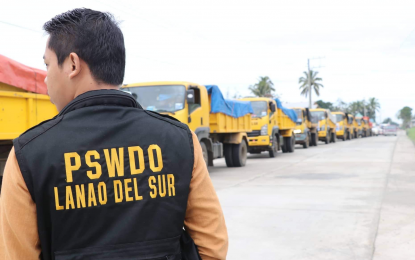 <p><strong>SENDING HELP</strong>. Staff from the Provincial Social Welfare and Development of Lanao del Sur looks at the truckloads of provisions that will be sent to the calamity-stricken Maguindanao province. The photo was posted by the provincial government on Wednesday (Nov. 2, 2022).<em> (Photo courtesy of Lanao del Sur PIO)</em></p>