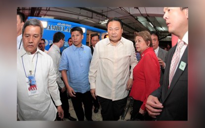<p><strong>VINDICATED.</strong> The late former chief justice Renato Corona and his wife, Cristina (3rd and 4th from left), arrive at the Senate building in Pasay City for his impeachment trial in this May 2012 file photo. The Sandiganbayan has dismissed the forfeiture case against Corona and his heirs, noting that an inaccurate statement of assets, liabilities and net worth assets cannot be labeled as unexplained wealth.<em> (Photo courtesy of Senate-PRIB)</em></p>