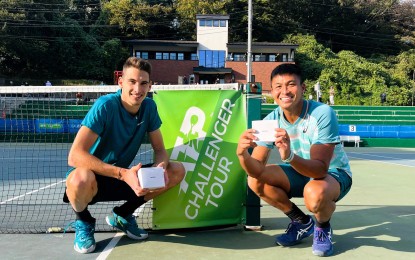 <p><strong>DOUBLES CHAMPION</strong>. Filipino-American Ruben Gonzales (right), and Romanian Victor Vlad Cornea were crowned doubles champion at the Yokohama Keio Challenger in Japan on October 5, 2022. <em>(Contributed photo) </em></p>