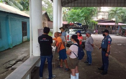 <p><strong>DEPOPULATION.</strong> The depopulating team gathers at the multipurpose gym of Barangay MV Hechanova in Leganes town prior to the conduct of the depopulation to ASF-affected swine. Five municipalities in Iloilo province have reported cases of ASF. <em>(Photo courtesy of Leganes LGU)</em></p>