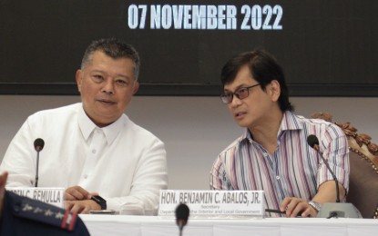 <p><strong>CHARGED.</strong> Justice Secretary Jesus Crispin Remulla (left) and Interior  Secretary Benjamin Abalos update newsmen about the Percy Lapid killing.  Remulla said murder charges were filed against former and present officials of the Bureau of Correction (BuCor). (<em>Photo by Benjamin Pulta)</em></p>