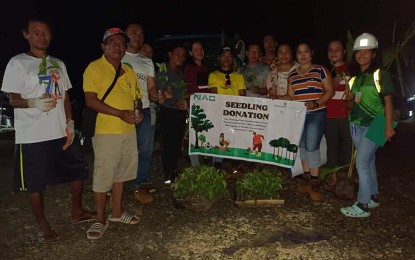 <p><strong>REFORESTATION</strong>. Some 2,400 seedlings were donated by the Hinatuan Mining Corporation-Taganaan Nickel Project to the municipality of Burgos in Surigao del Norte on Sunday (Nov. 6, 2022). The seedlings will be planted in the watershed areas of the town and in sites where trees were damaged by typhoon Odette last year. <em>(Photo courtesy of Burgos LGU)</em></p>