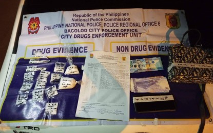 <p><br /><strong>DRUG BUST</strong>. Operatives of the City Drug Enforcement of Bacolod City Police Office seize 201 grams of suspected shabu worth PHP1.37 million from Alijis village councilor Abby Araneta during a buy-bust on Tuesday (Nov. 8, 2022). The suspect, 28, considered a high-value individual, is now on her second term as a village official. <em>(Photo courtesy of Bacolod City Police Office)</em></p>