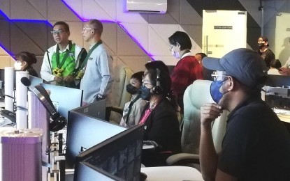 <p><strong>STATE OF THE ART.</strong> Department of Science and Technology Secretary Renato Solidum (right) discusses with Baguio City Mayor Benjamin Magalong and DOST-Cordillera Director Dr. Nancy Bantog (in red) the more advanced systems developed by the department that the city government can use in further improving its smart city operations center during the secretary’s tour of the operations center of the city government on Monday (Nov. 7, 2022). Baguio's smart city project got initial funding of PHP200 million from the Office of the President in 2020. <em>(PNA photo by Liza T. Agoot)</em></p>